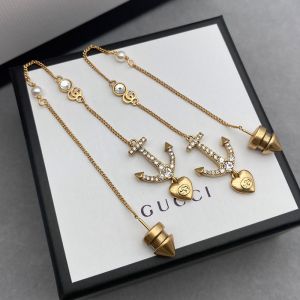 Gucci Crystal Anchor Heart Charm Long Earrings In Gold