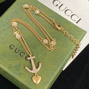 Gucci Crystal Anchor Heart Charm Necklace In Gold
