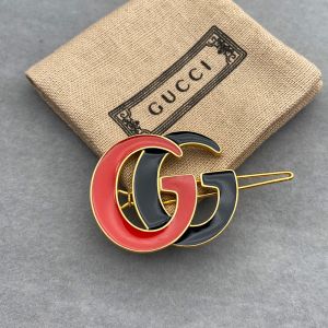 Gucci Enamel Double G Hair Slides In Gold