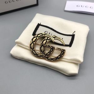 Gucci GG Textured Hair Slides In Gold