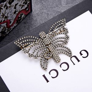 Gucci Interlocking G Crystals Butterfly Hair Slides In Gold