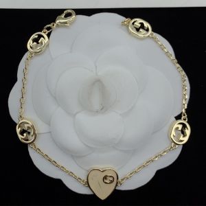 Gucci Interlocking G Enamel Heart Bracelet In Gold