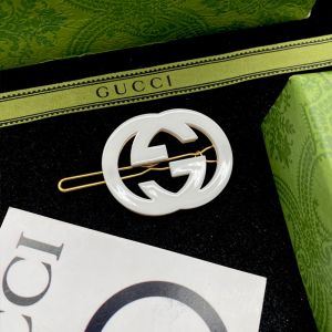 Gucci Interlocking G Silicone Hair Slides In Gold/White