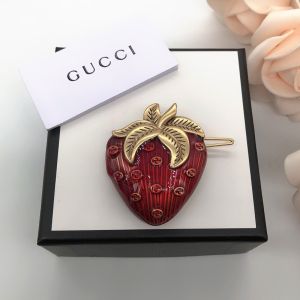 Gucci Interlocking G Strawberry Hair Slides In Gold