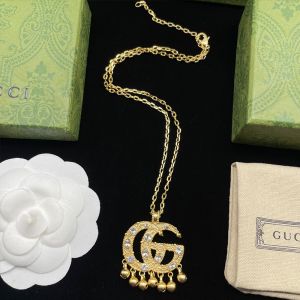 Gucci Interlocking GG Crystals Pendant Necklace In Gold