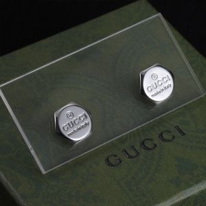 Gucci Logo Engraved Earrings In Silver