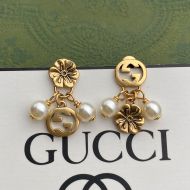 Gucci Interlocking G Flower Pearl Asymmetrical Earrings In Gold