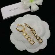 Gucci Letter Logo Hoop Earrings In Gold