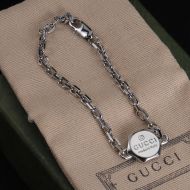Gucci Logo Engraved Bracelets In Silver