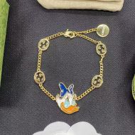 Gucci X Disney Enamel Daisy Duck Pendant Bracelets In Gold